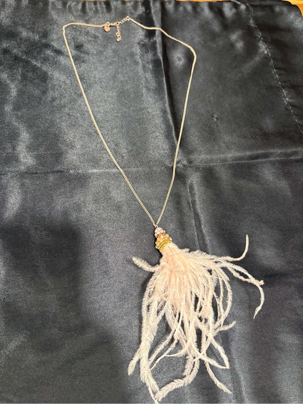 Delicate Pink Feather Tassel Necklace with Beaded Accent